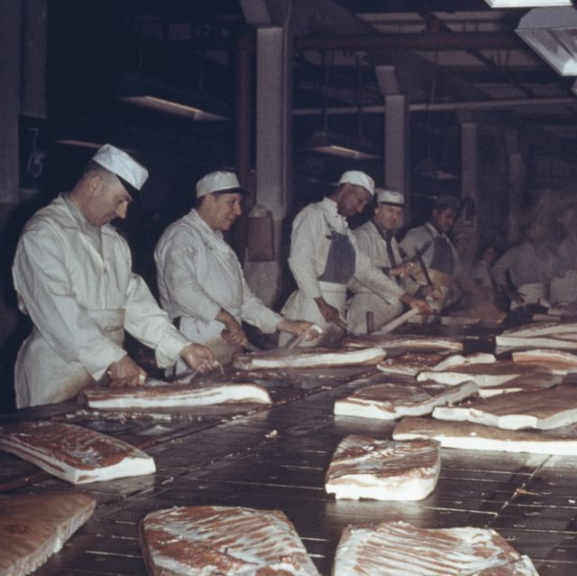 men prepare bacon at a meat packing plant in chicago, usa, circa 1955 photo by archive photosgetty images