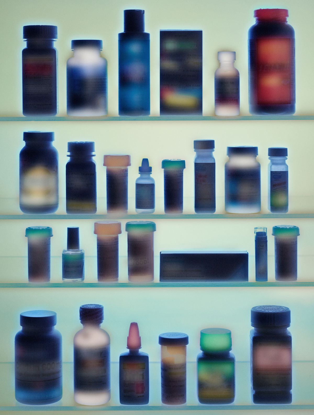 medicine bottles in cabinet