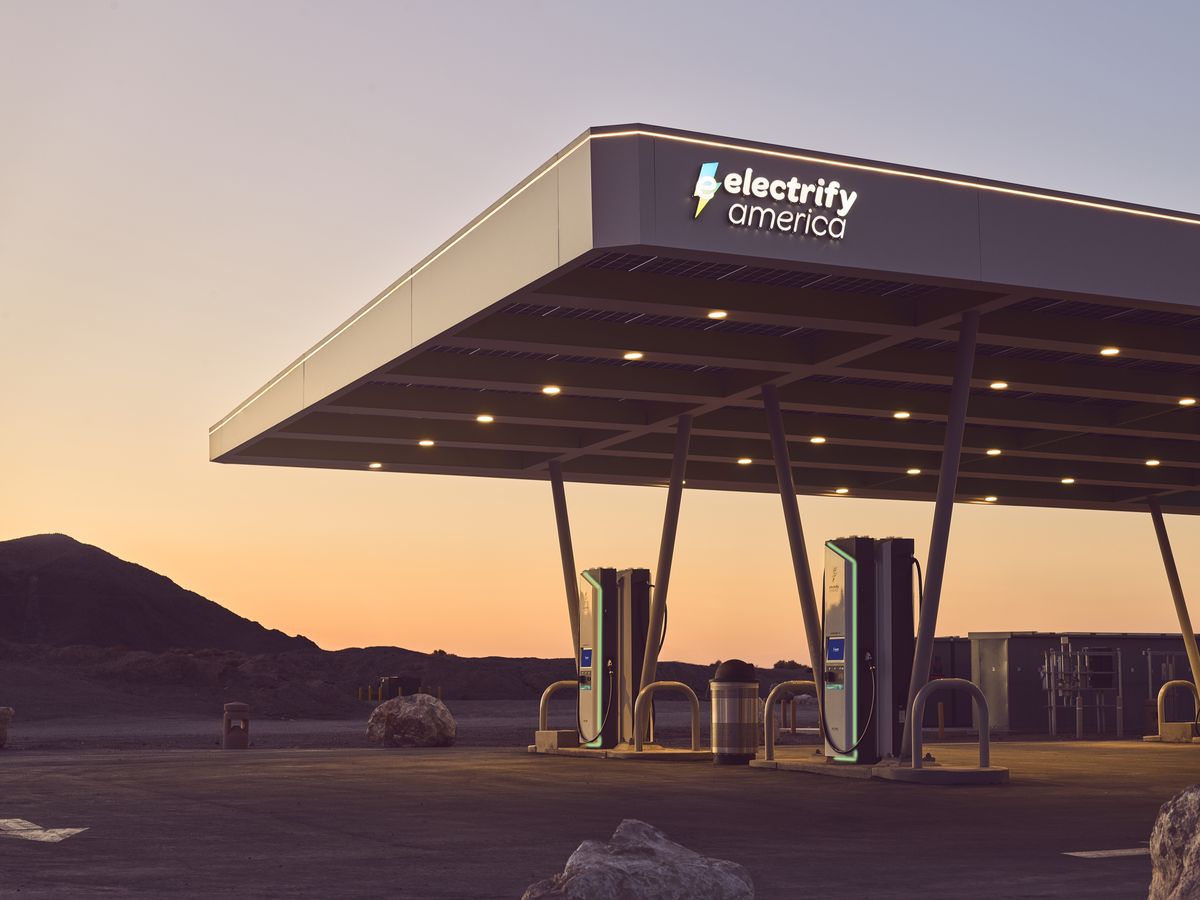 electrify america station in desert at sunset