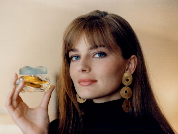 Mega-model Paulina Porizkova gets playful with a bottle of knowing perfume. She was in town recently