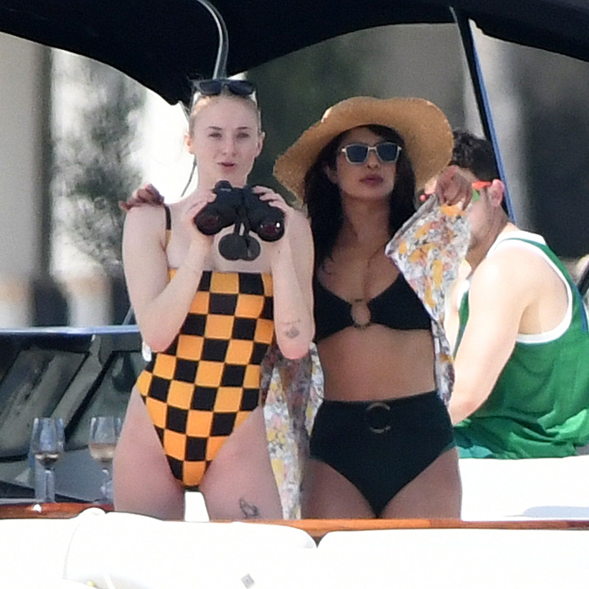 Bikini clad BFF's Sophie Turner and Priyanka Chopra enjoy a yacht day with Joe Jonas and Nick Jonas in Miami