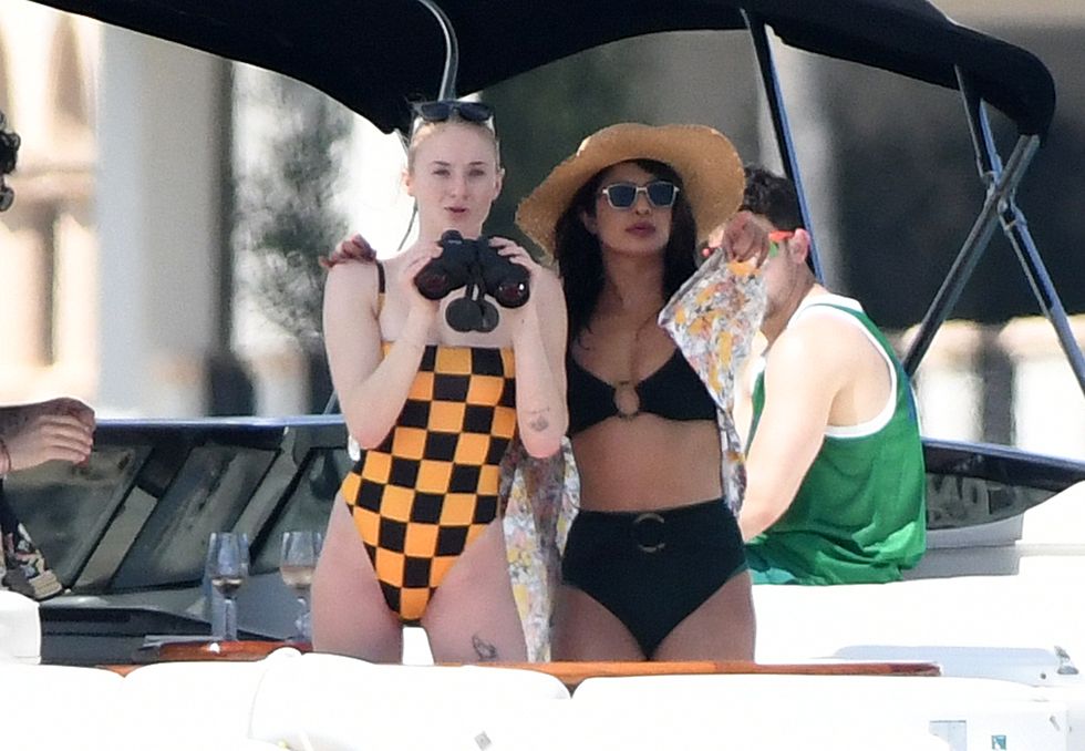 Bikini clad BFF's Sophie Turner and Priyanka Chopra enjoy a yacht day with Joe Jonas and Nick Jonas in Miami