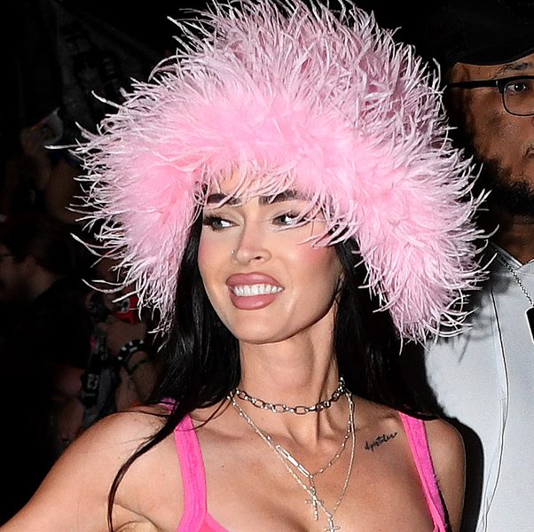 Megan Fox Goes Barbiecore in Pink Bra Top, Pumps & Fuzzy Hat in
