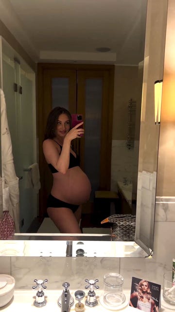 megan mckenna shows off baby bump in mirror selfie