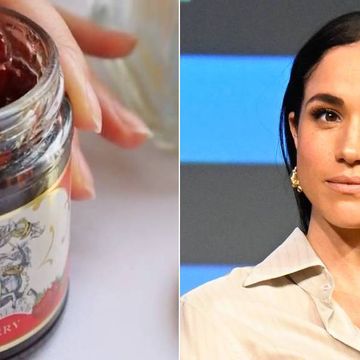 a woman holding a jar of jam