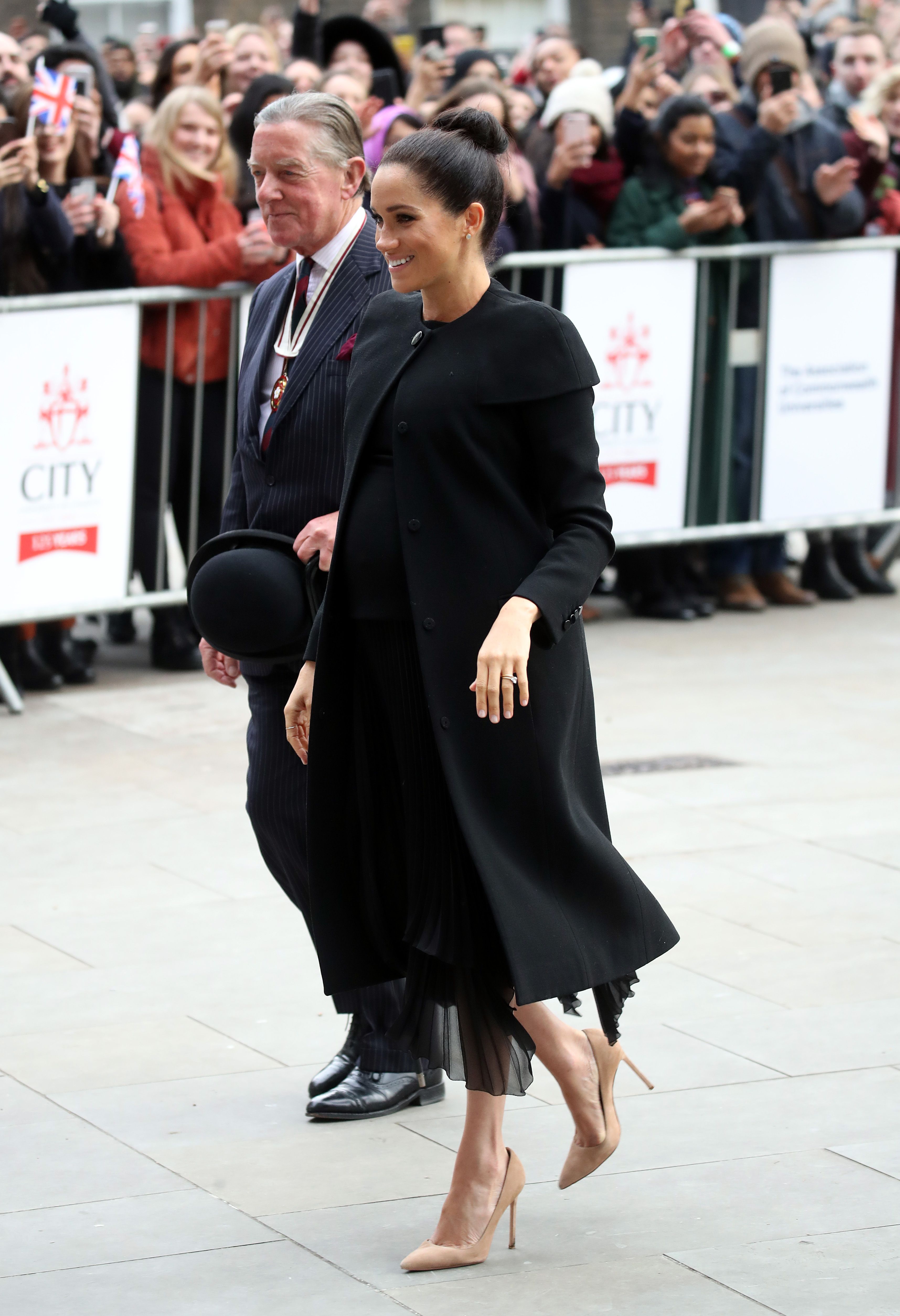 Meghan Markle Wore a Sleek Givenchy Coat to the Association of