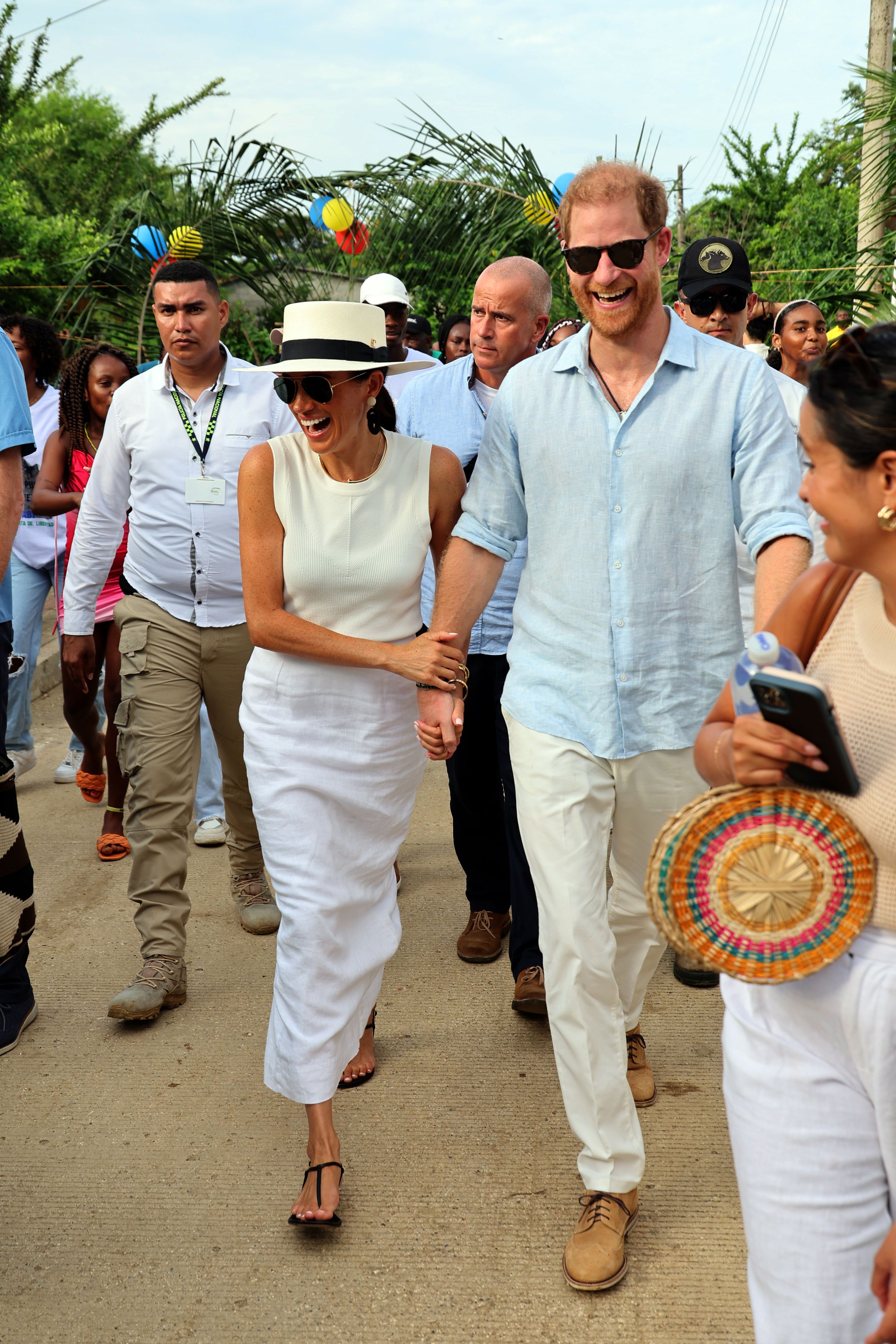 Meghan Markle Wears Argent Top and Long White Skirt in Cartagena