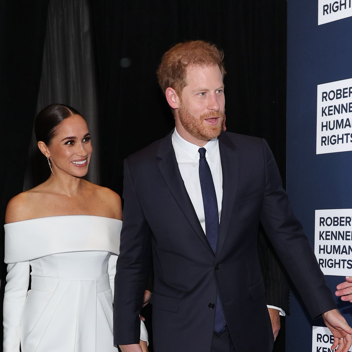 Meghan looks timeless in a white Louis Vuitton gown