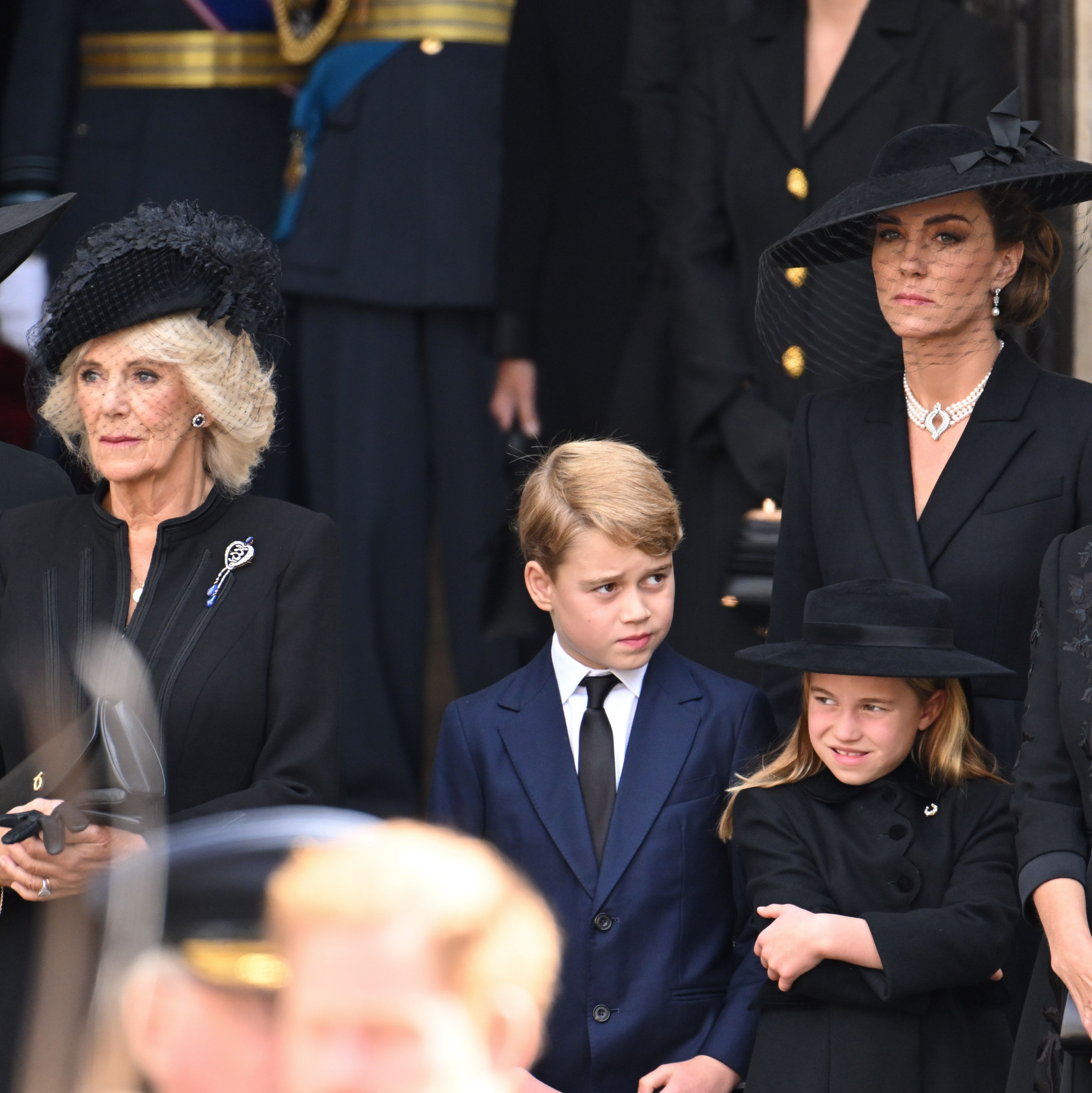 The Prince and Princess of Wales' oldest child didn't quite dress in black like everyone else. 