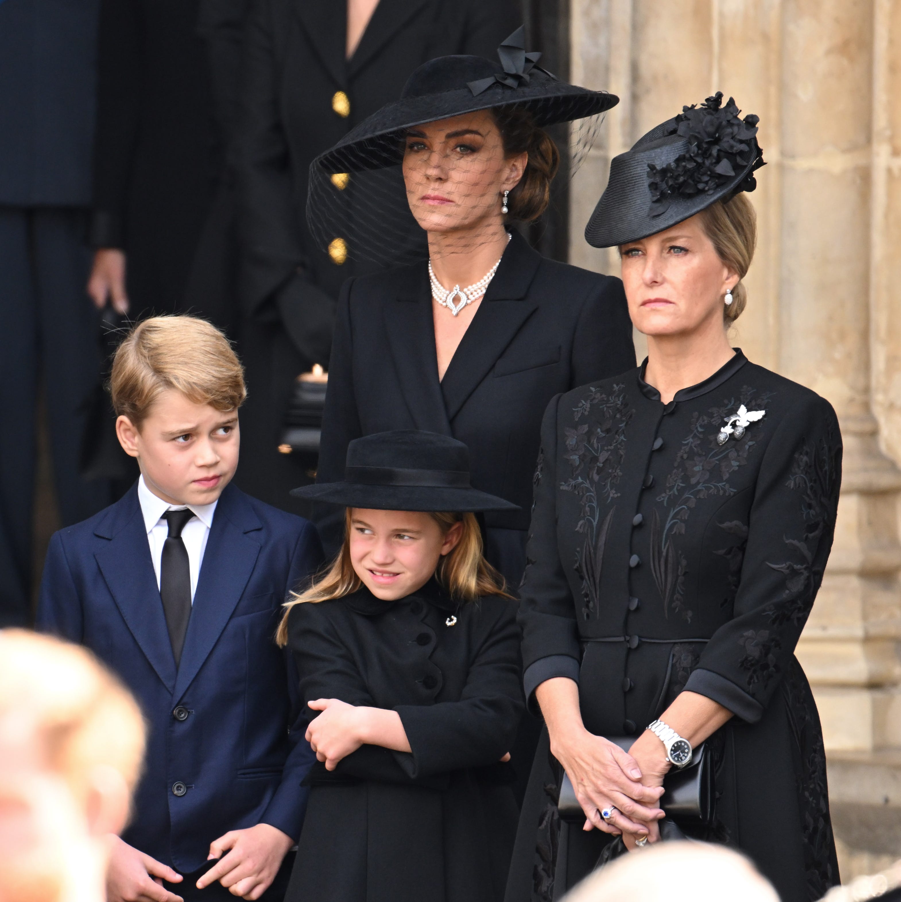 The Prince and Princess of Wales' oldest child didn't quite dress in black like everyone else. 