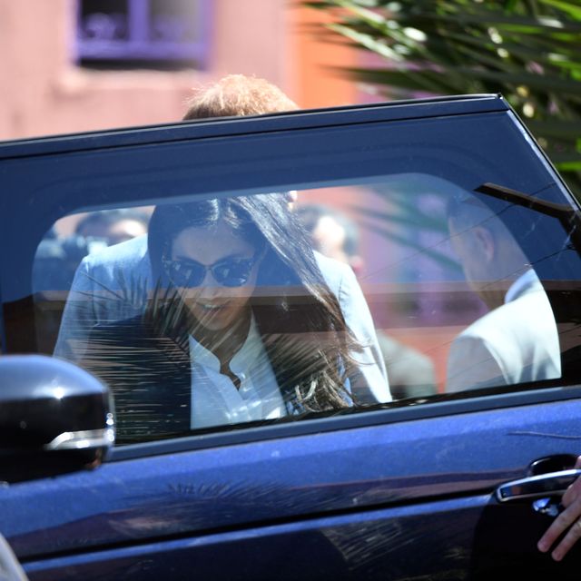 meghan markle and prince harry getting in a car while in morocco