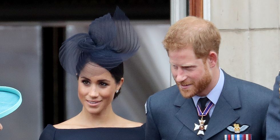 Meghan Markle and Prince Harry shared a sweet PDA moment on Buckingham Palace balcony