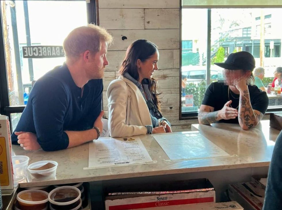 a group of people sitting at a table