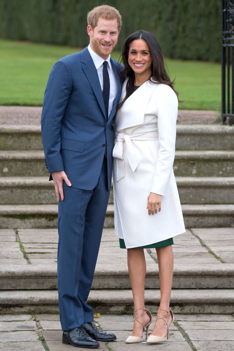 a man and woman posing for a picture, prince harry and meghan markle engagement announcement