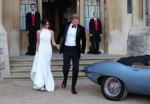 Meghan Markle in her Stella McCartney reception dress with Prince Harry
