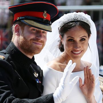 prince harry and meghan markle wave to crowds on their wedding day