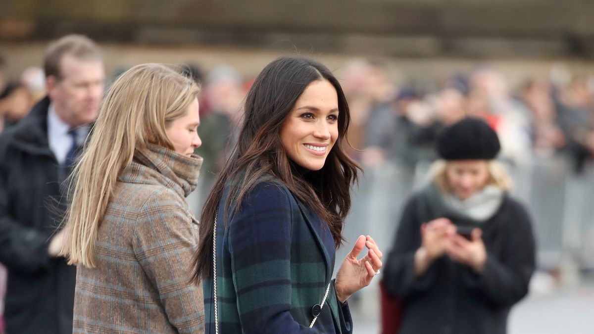 Meghan Markle Steps Out With Prince Harry Wearing This Season's It Bag