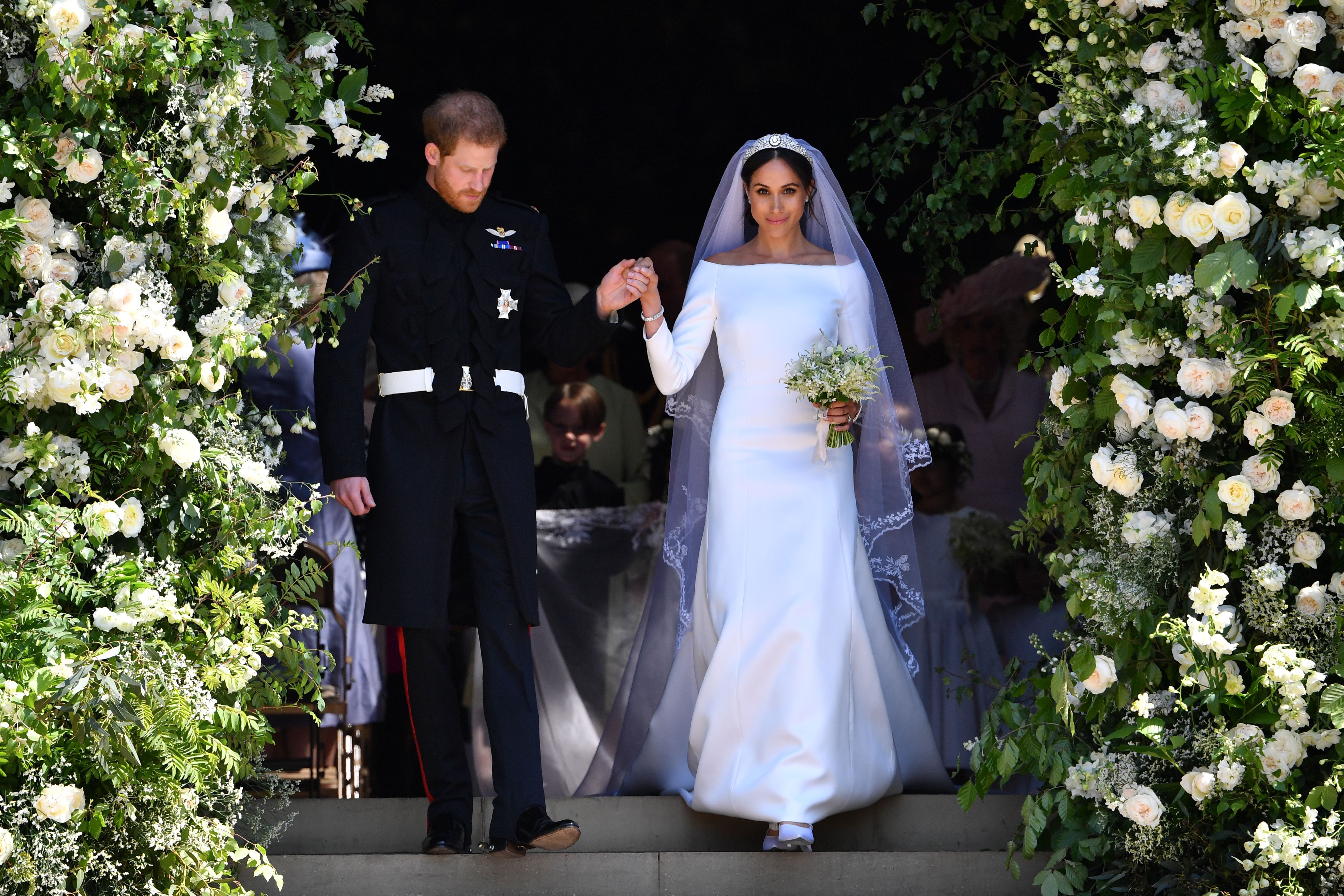 10 Things You Missed About Meghan Markle s Two Wedding Dresses