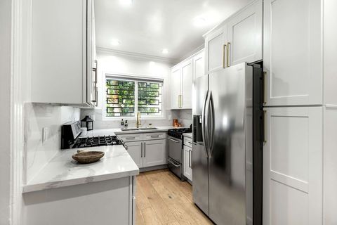 Room, Major appliance, Property, Floor, Kitchen appliance, White, Interior design, Home appliance, Kitchen, Kitchen stove, 