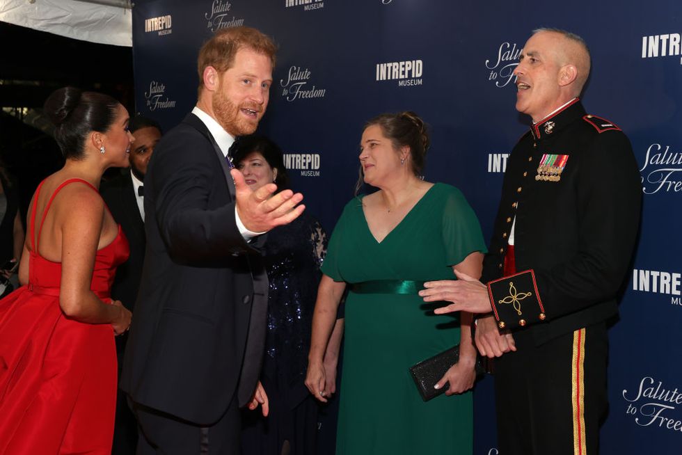new york, new york   november 10 l r meghan, duchess of sussex, prince harry, duke of sussex and cwo5 stephen rudinski, valor award recipient attend the 2021 salute to freedom gala at intrepid sea air space museum on november 10, 2021 in new york city photo by dia dipasupilgetty images