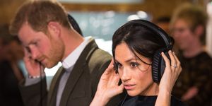 london, england january 09 prince harry and meghan markle listen to a broadcast through headphones at reprezent 1073fm in pop brixton on january 9, 2018 in london, england the reprezent training programme was established in peckham in 2008, in response to the alarming rise in knife crime, to help young people develop and socialise through radio photo by dominic lipinski wpa poolgetty images