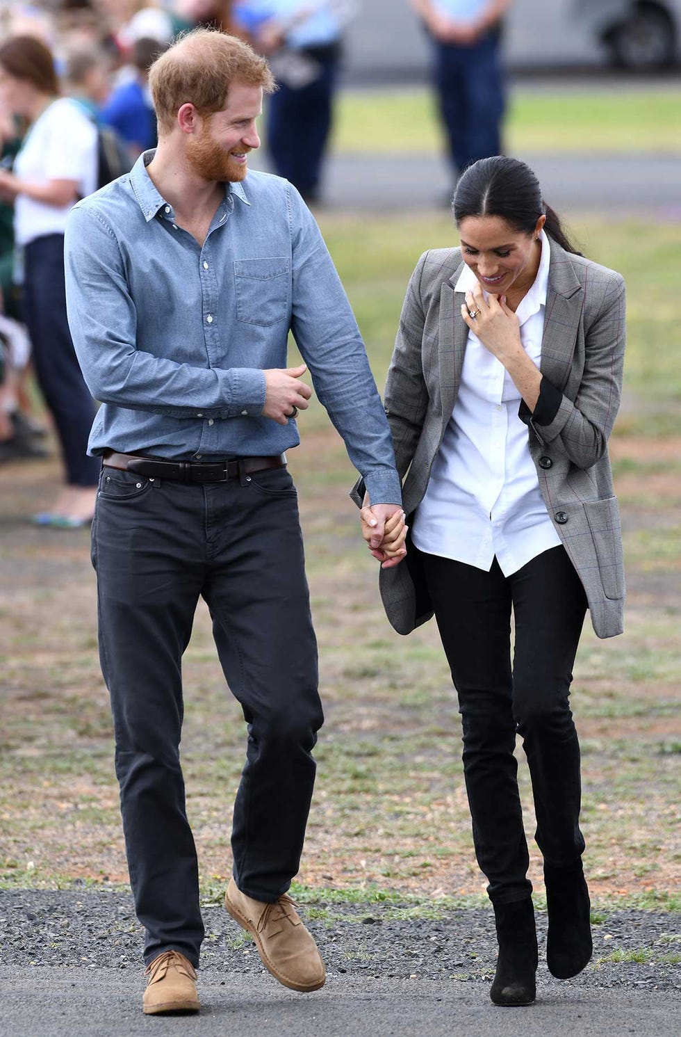 Harry Meghan de la mano en Australia