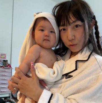 The Experimental Nail Artist With a Brand-New Baby the nail artist known online as nailsbymei holding her daughter