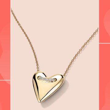 mejuri diamond earrings, heart necklace and letter bracelet