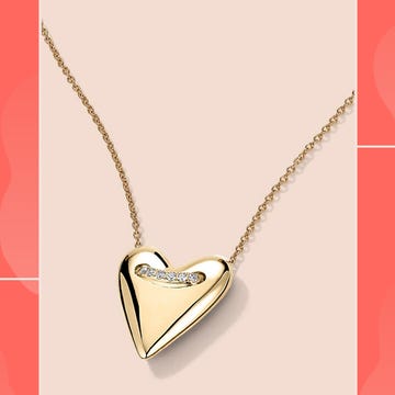 mejuri diamond earrings, heart necklace and letter bracelet