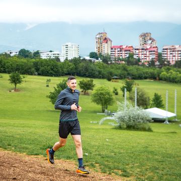 member of the army exercising in the park