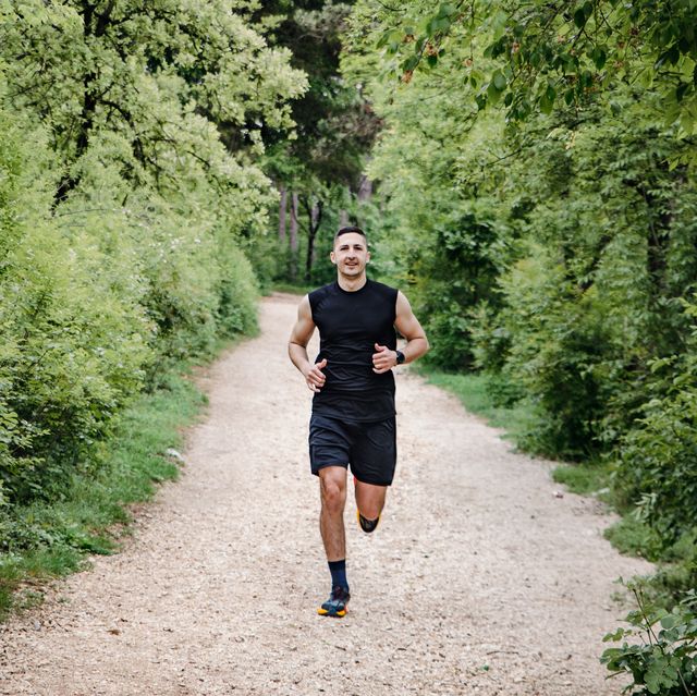 member of the army exercising in the park