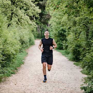 member of the army exercising in the park