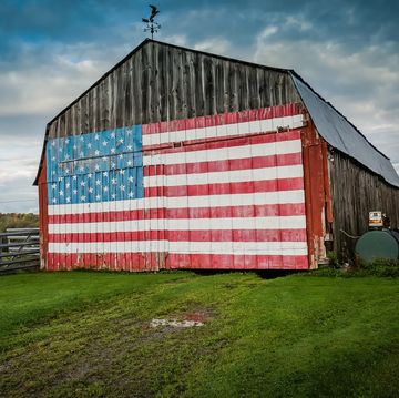 american flag on barn