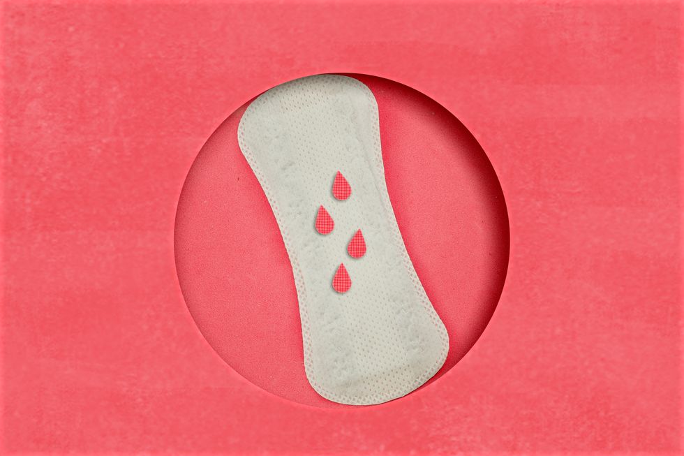 menstrual  pads in pink paper background menstruation time