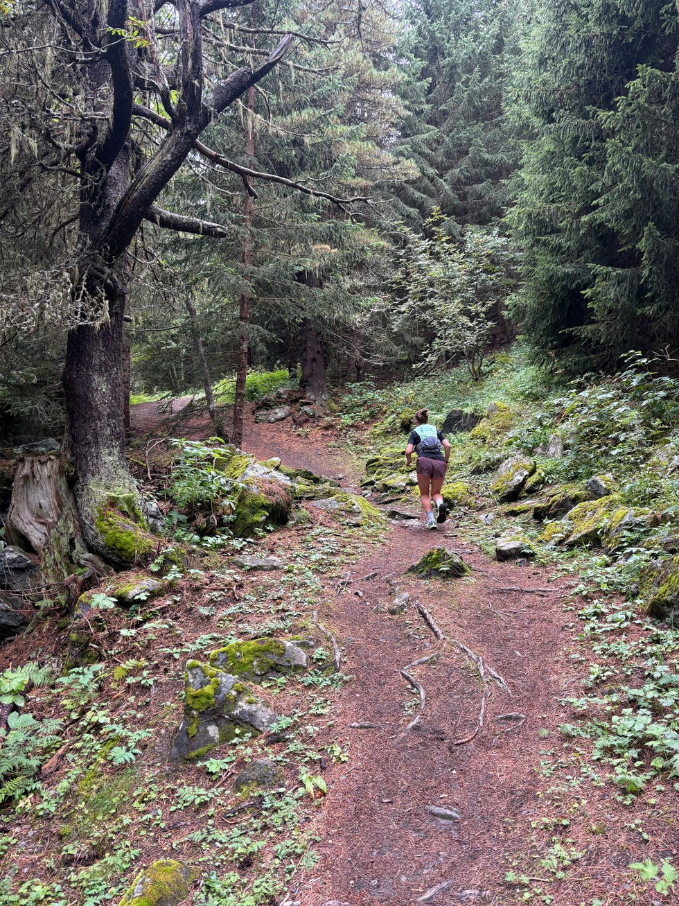 woman running in a forest