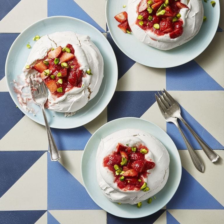 meringues with strawberry rhubarb compote on top