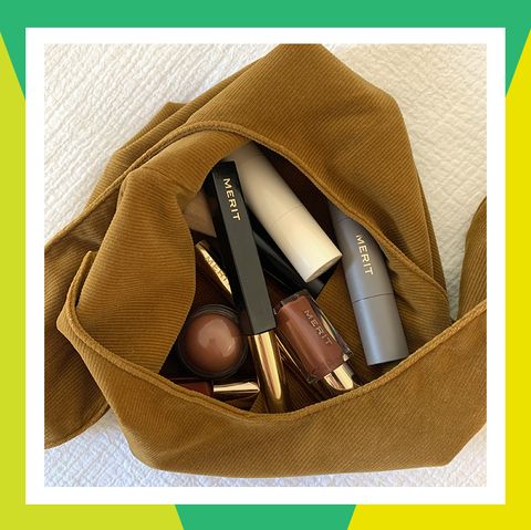 merit makeup in brown corduroy bag