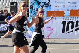 two runners celebrating during a competitive event