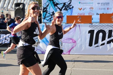 two runners celebrating during a competitive event