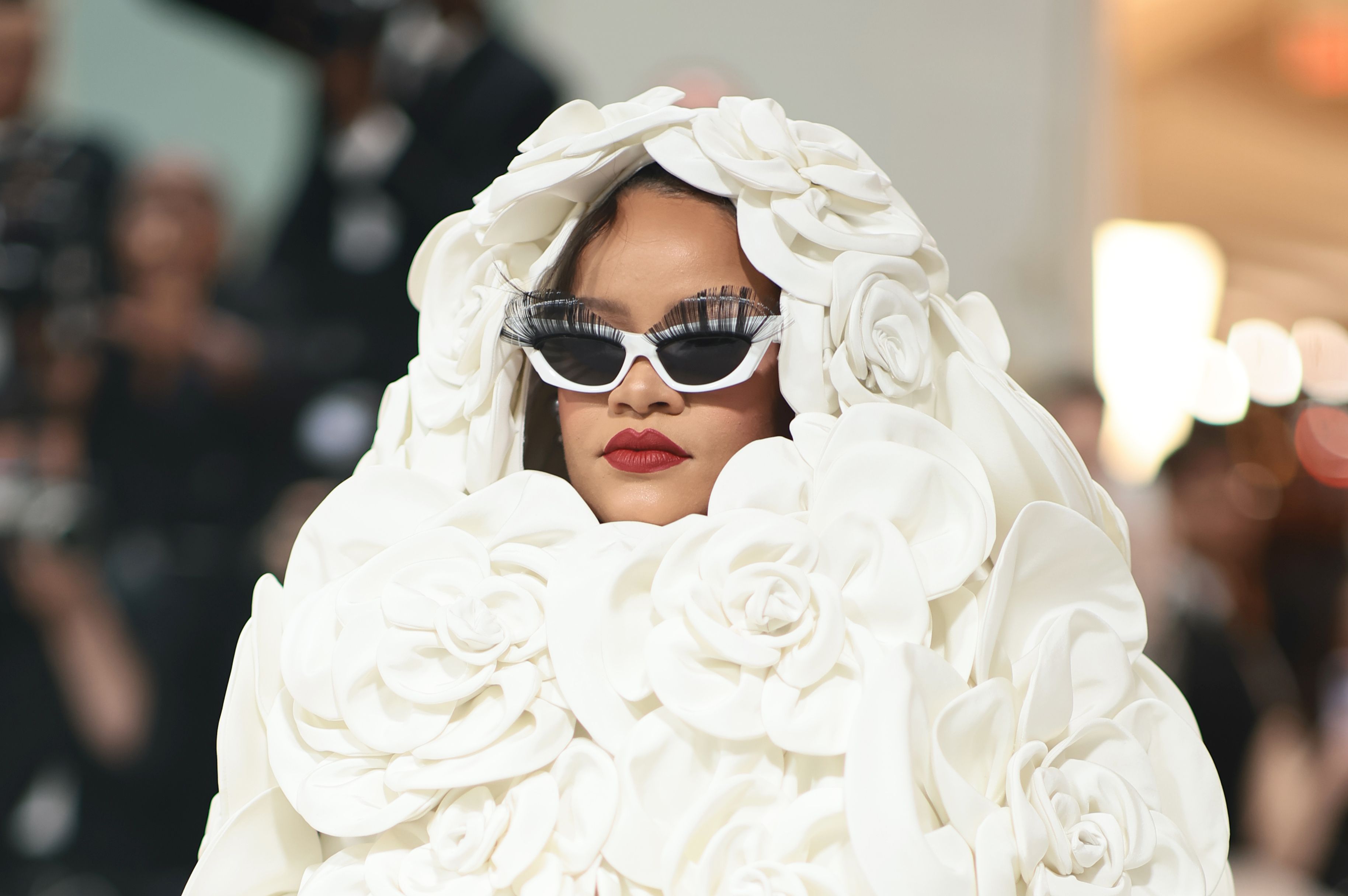 Pregnant Rihanna Blooms in Valentino Dress on Met Gala Red Carpet 2023 –  Footwear News
