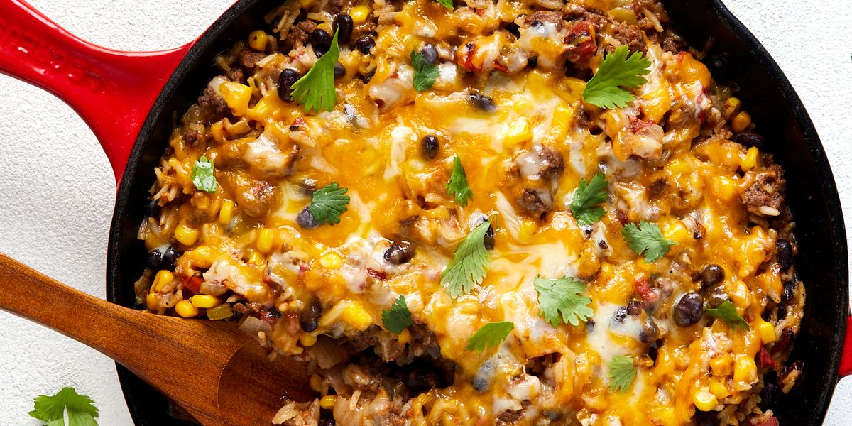 mexican beef 'n rice skillet topped with melty cheese and cilantro