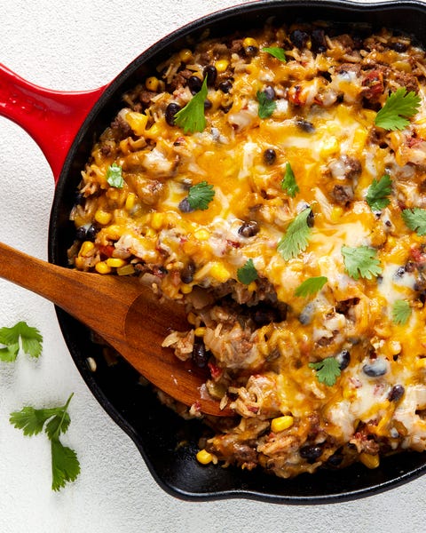 mexican beef 'n rice skillet topped with melty cheese and cilantro