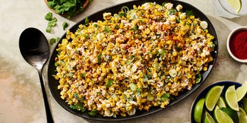 mexican corn salad mixed in a bowl