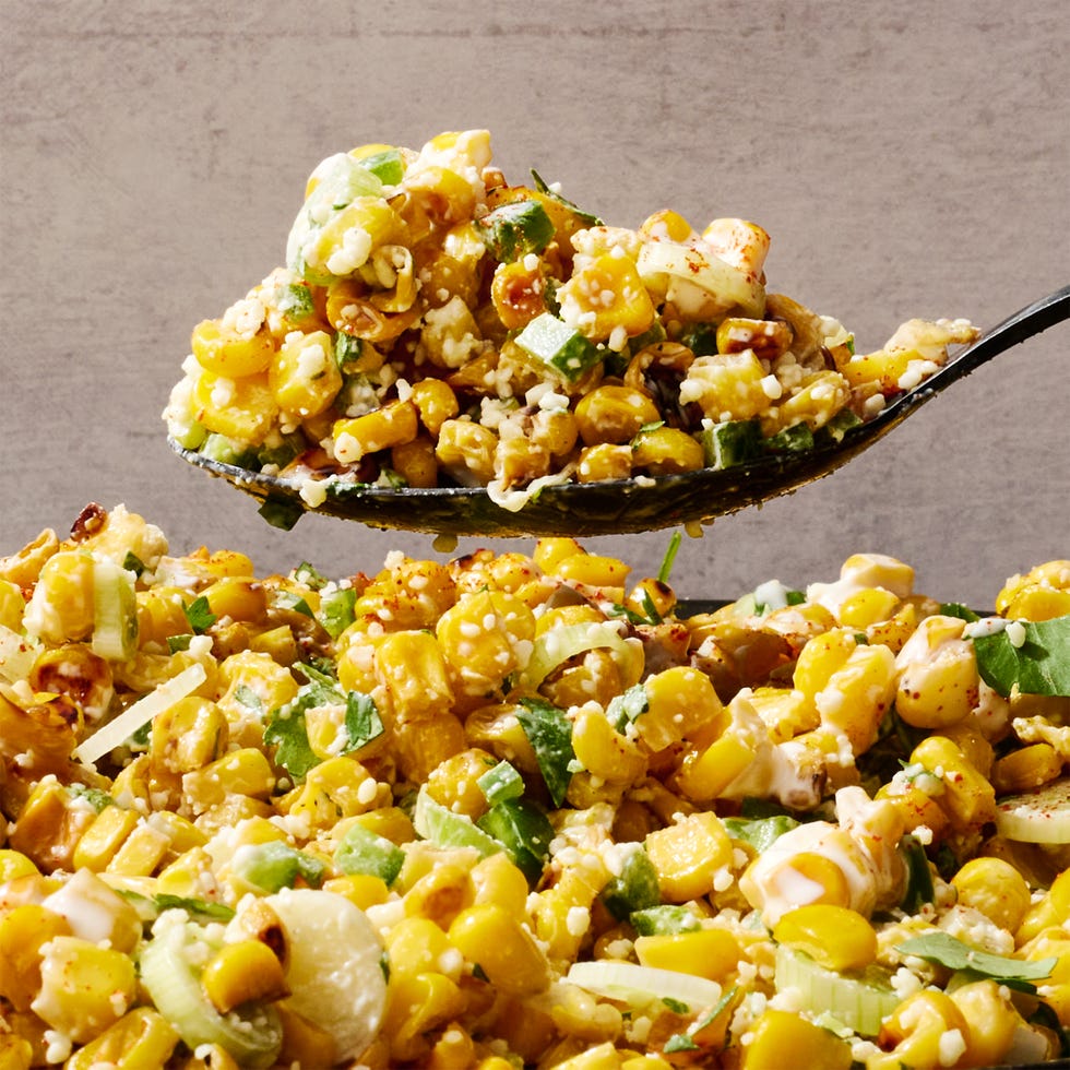 mexican corn salad mixed in a bowl