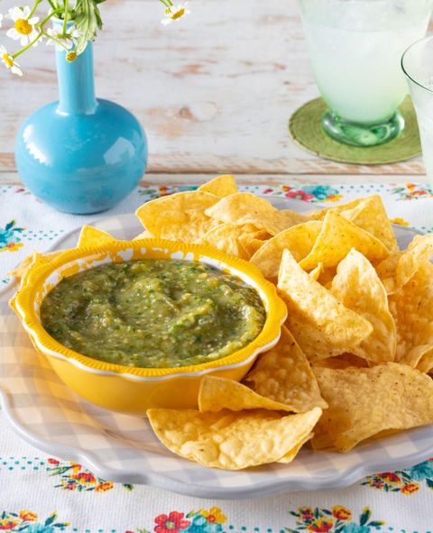 mexican recipes homemade tomatillo salsa in yellow bowl with chips