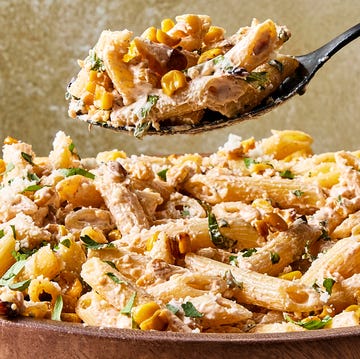 Mexican Street Corn Pasta Salad pasta salad tossed in a creamy sauce, corn, and cilantro