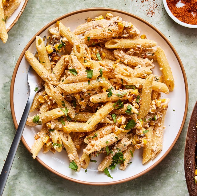 Mexican Street Corn Pasta Salad pasta salad tossed in a creamy sauce, corn, and cilantro
