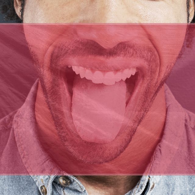 a man with a red rectangle over his face, representing a dental dam