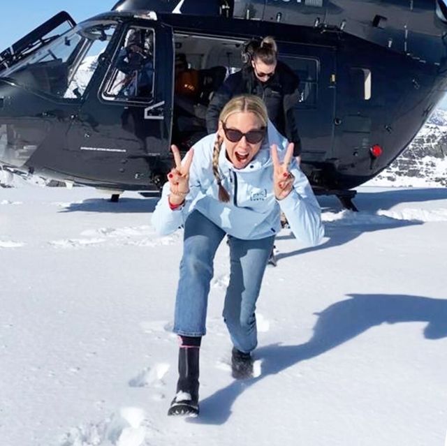 the author ducking under helicopter blades on a glacier and the air new zealand plane that flies direct from new york to new zealand