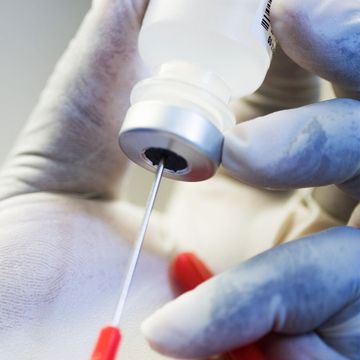 needle in vaccine vial